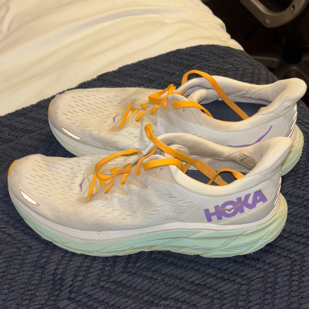 Hoka White Sneakers with Yellow Laces and Purple Accents